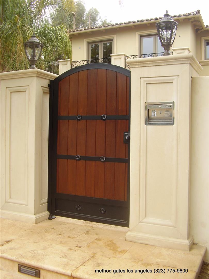 wooden gate and concrete fence - Los Angeles Gate Company