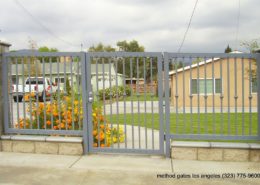 wrought iron fence with with entrance gate