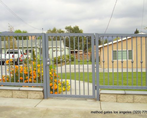 wrought iron fence with with entrance gate