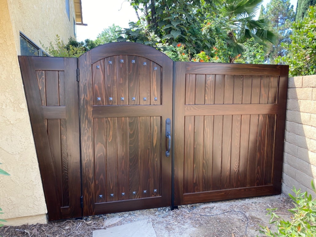 custom stained wood gates with clavos
