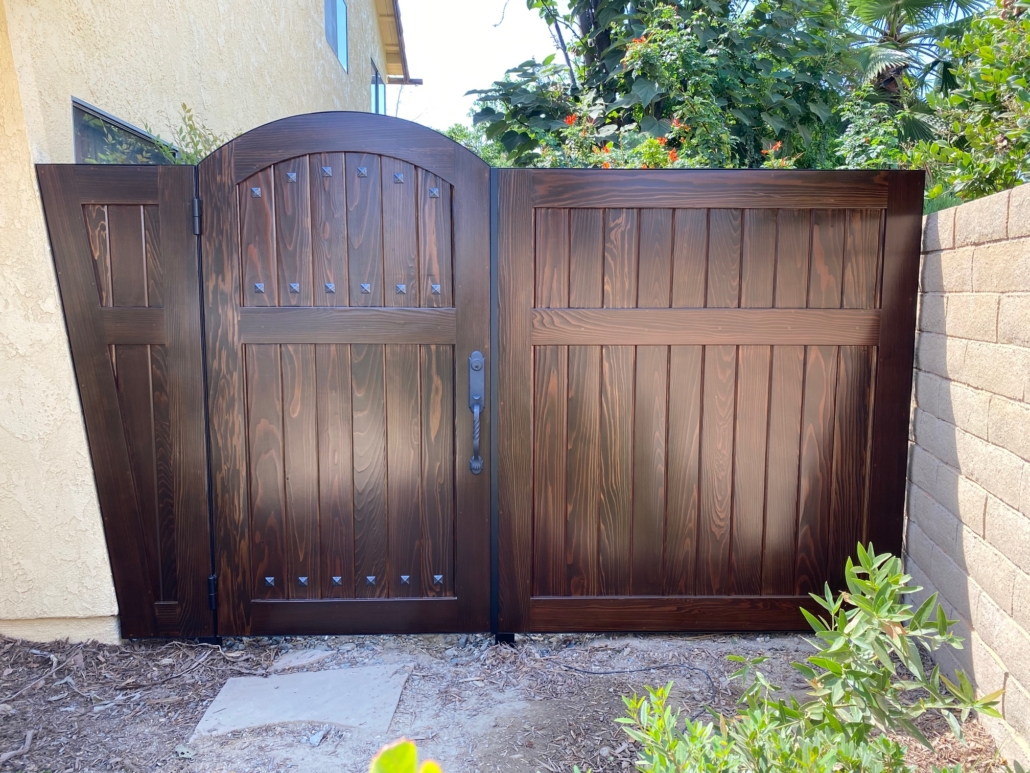custom stained wood gates with clavos