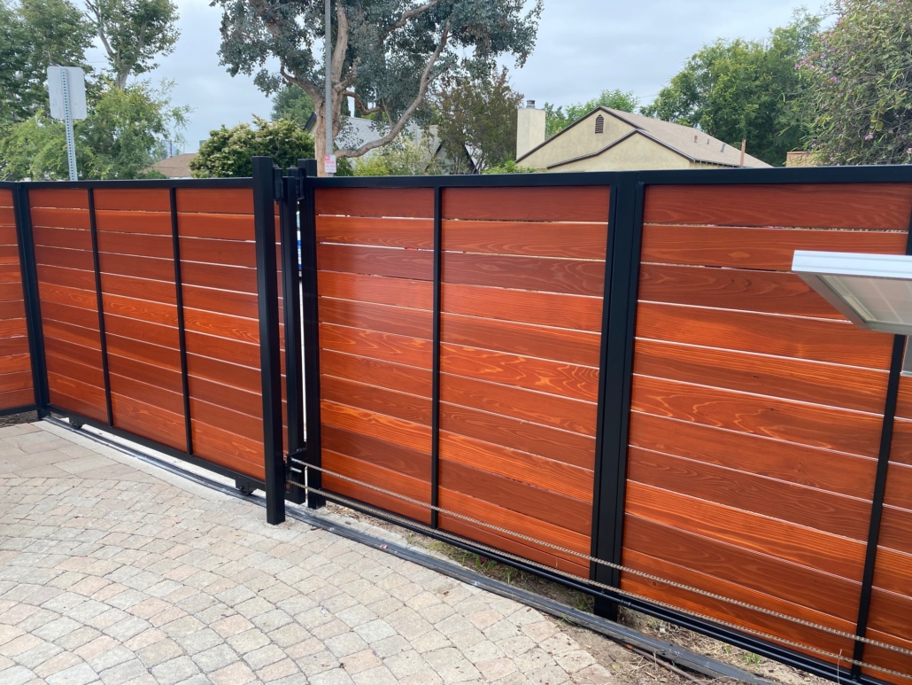 Electric driveway gates with solar panel