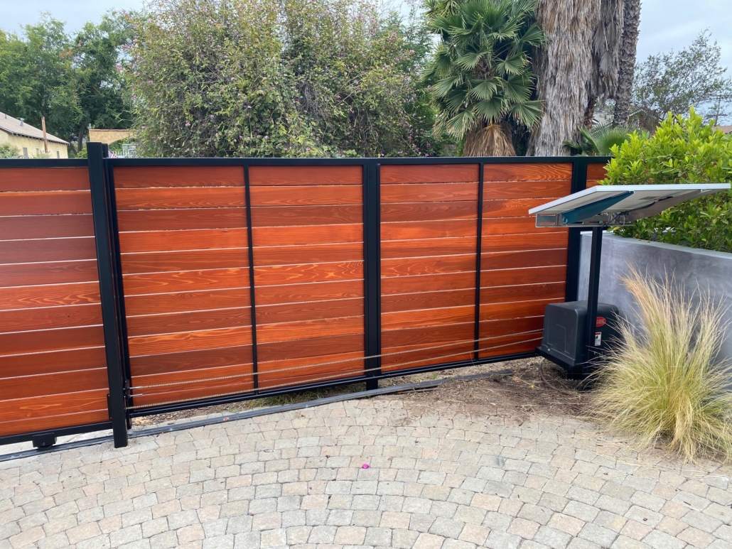 Electric driveway gates with solar panel